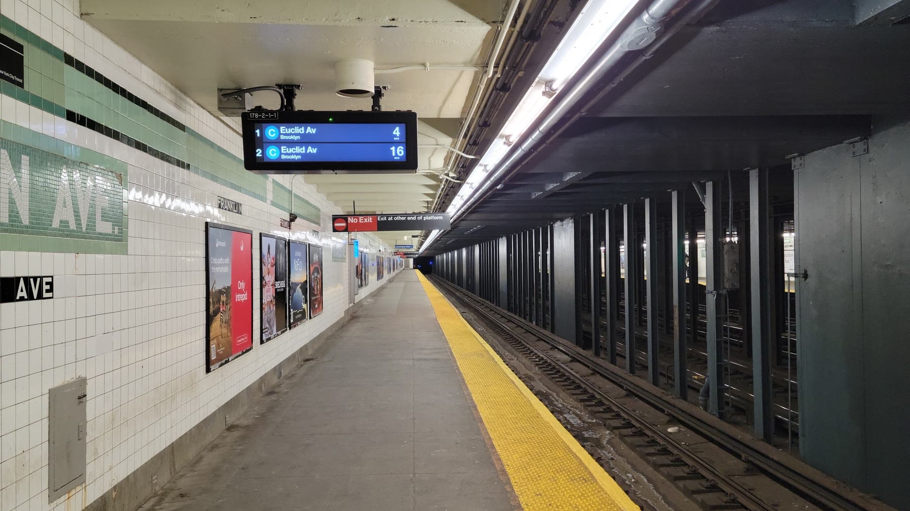 The Franklin Avenue platform on the IND Fulton Street line, with a countdown clock for the C train